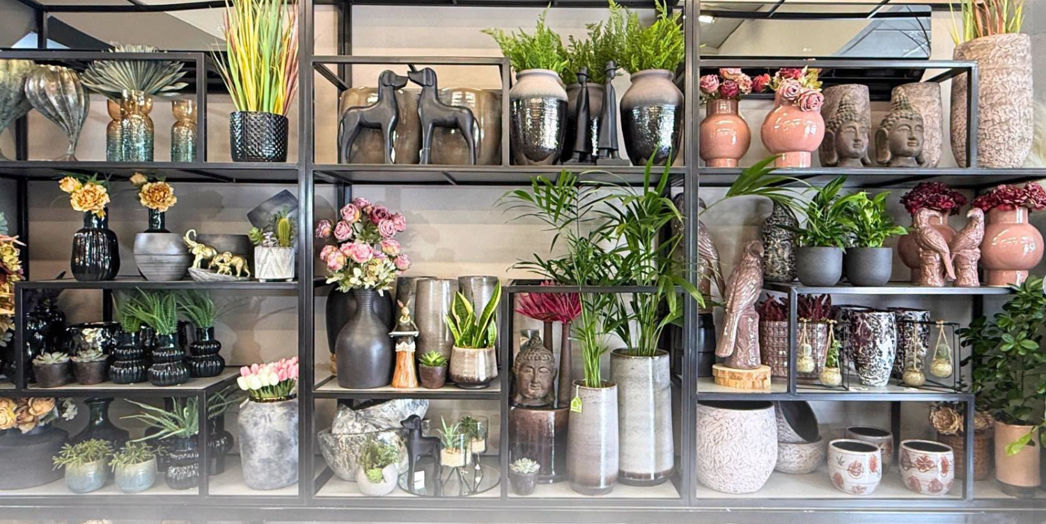 Unico Fiori shop display with vases, plants and floral arrangements
